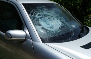 car with smashed windshield